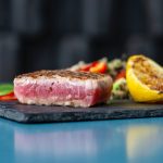 grilled tuna with salad in a square plate